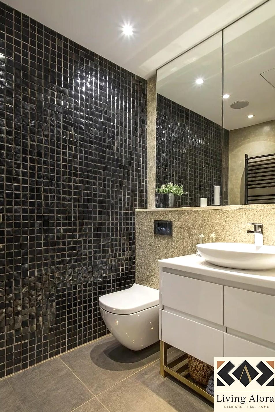 Black Mosaic Tile Feature Wall Behind a Bed