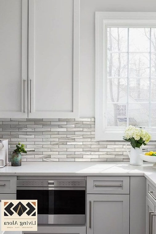 13 Backsplash for Gray and White Cabinets Ideas to Inspire Your Next Renovation 14 Full-Height Slab Backsplash Behind the Range