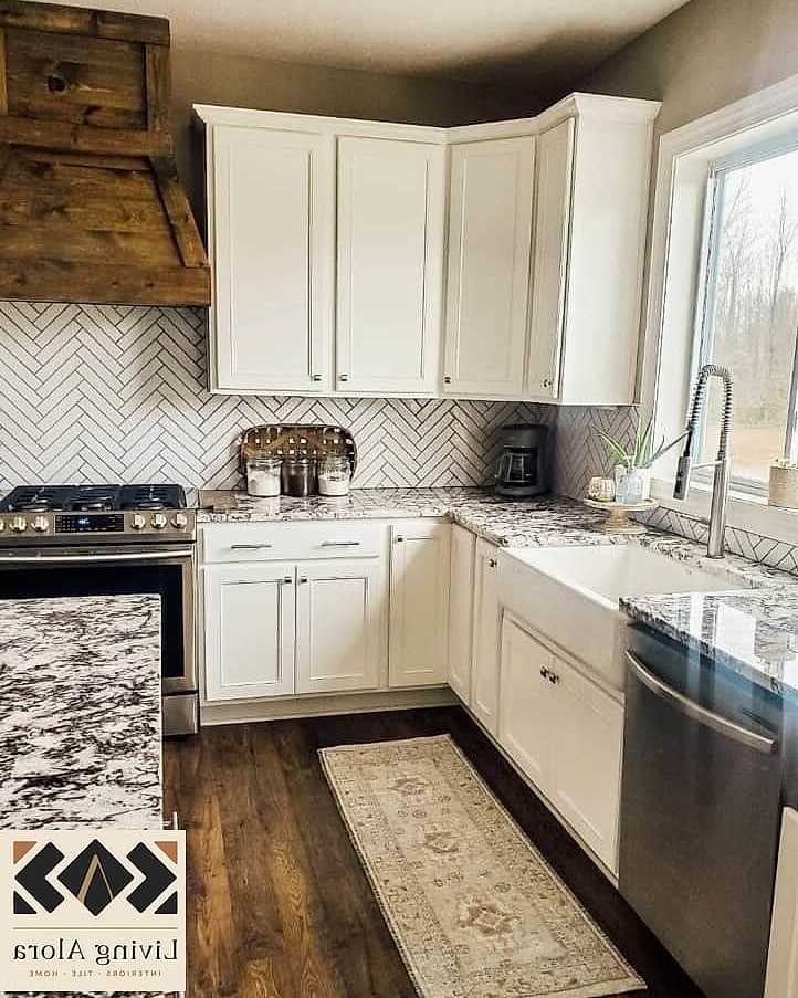 19 Backsplash for Busy Granite Stylish Tile Ideas to Inspire Your Next Renovation 7 Herringbone Pattern in a Single Neutral Color