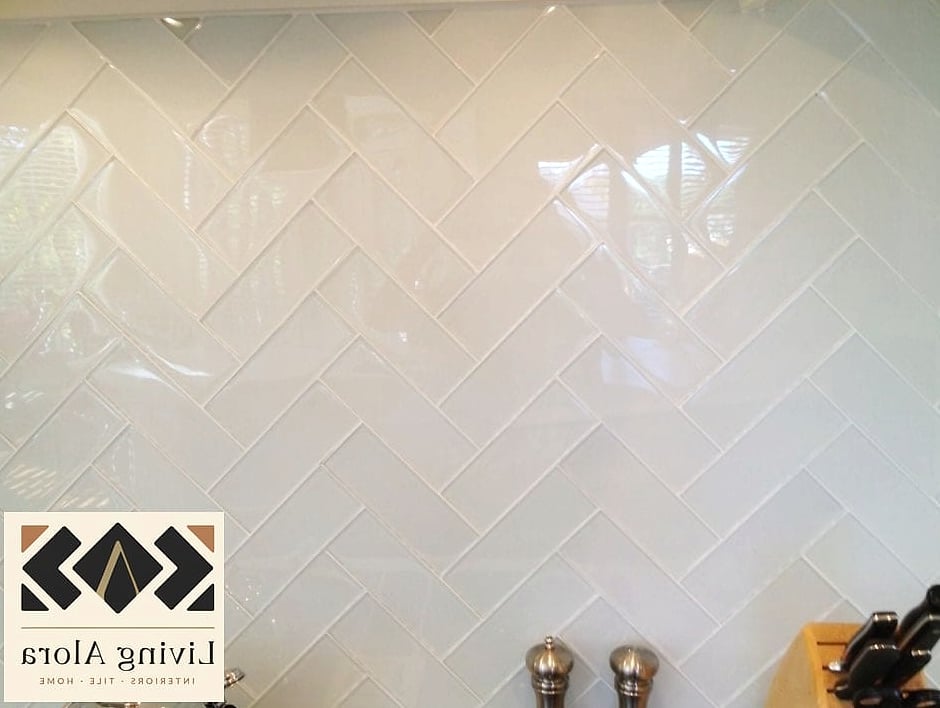 13 Glass Subway Tile Ideas We Can't Stop Pinning 5 Herringbone Pattern for a Statement Wall