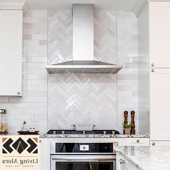21 Marble Herringbone Backsplash Ideas That Look Expensive But Aren't 8 Marble Herringbone Behind the Range Only