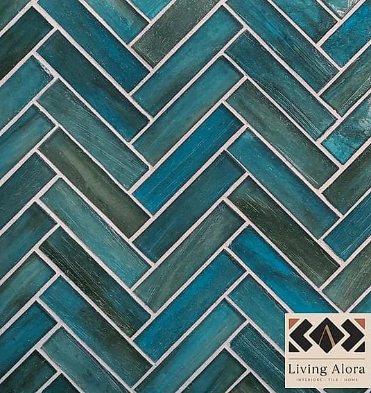 21 Trendy Colorful Herringbone Backsplash Ideas That Work in Any Size Home 10 Teal Glass Herringbone Around a Range Hood