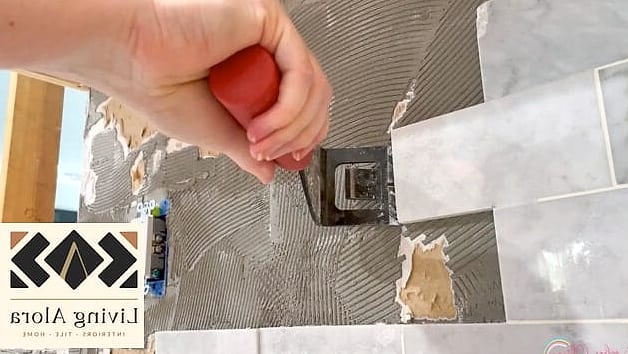 Use a Floor Scraper for Large Flat Panels