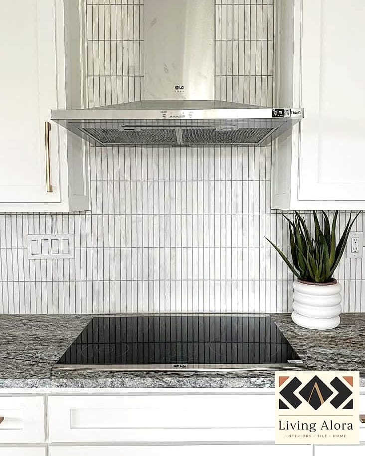 19 Backsplash for Busy Granite Stylish Tile Ideas to Inspire Your Next Renovation 9 Vertical Stacked Subway Tile