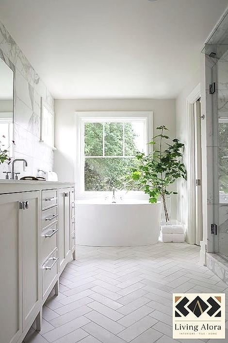 21 White Bathroom Ideas That Maximize Style and Function 10 White Herringbone Floor Tile