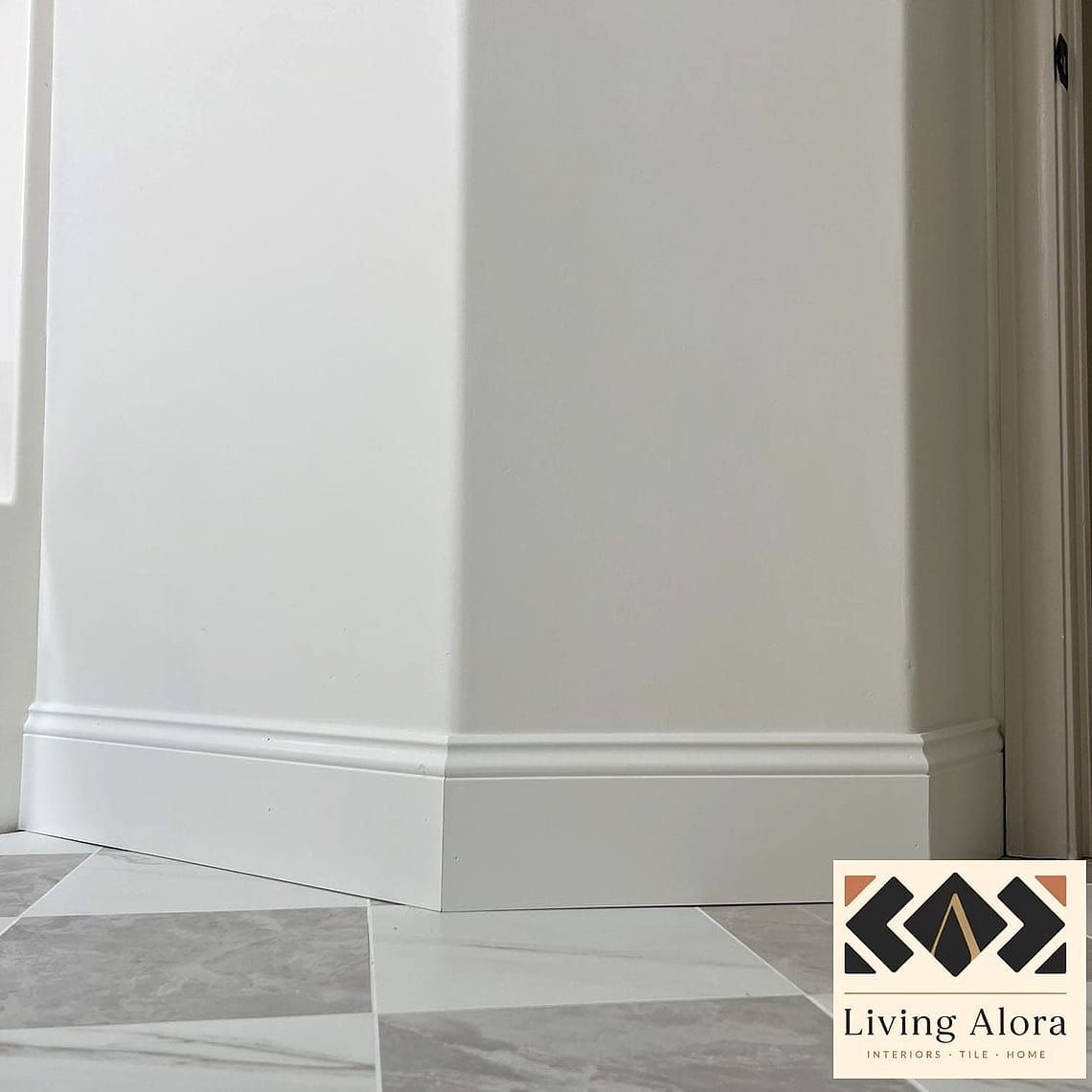 White Tile Baseboards Instead of Wood